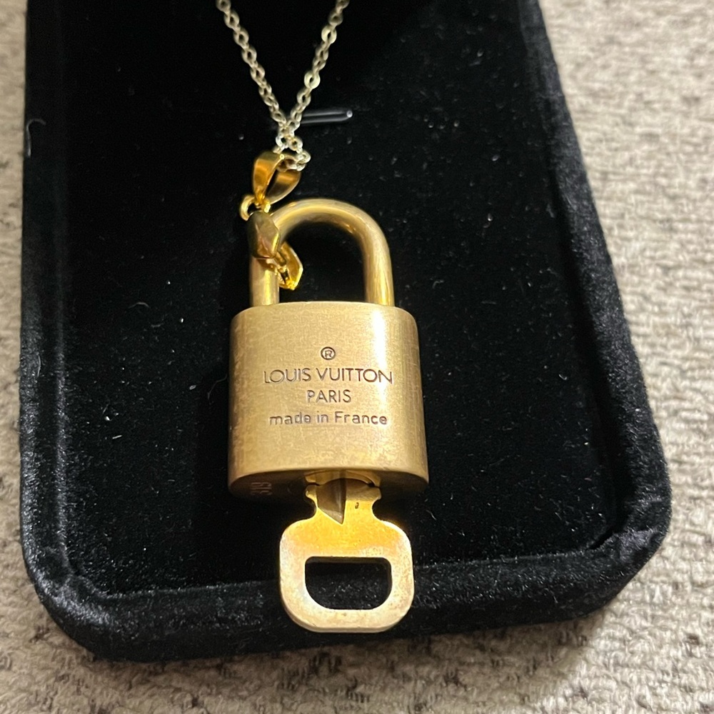 Louis Vuitton lock and key necklace. 18” long. Lock number 319. - Picture 2 of 8